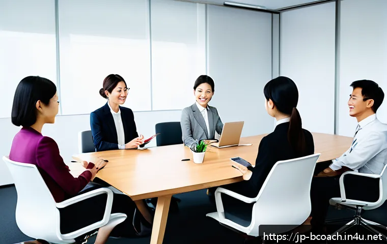 비즈니스 코칭과 중소기업 지원 - A modern Japanese office scene showing diverse employees engaged in open communication around a conf...